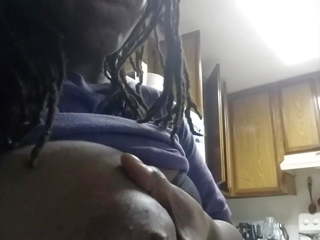 Ebony squeezes Milk from Her Big Black Boob for Youtube