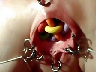 Extremely bizarre pierced vaginal insertions