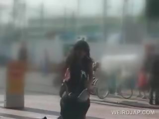 Stupendous jepang deity masturbates with dildo on her bike